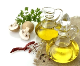11267646 - olive oil spices and mushrooms on white background